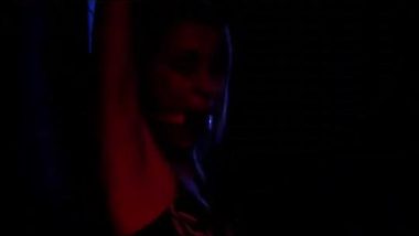 Tortured girl in front of friends